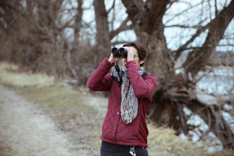A person using binoculars